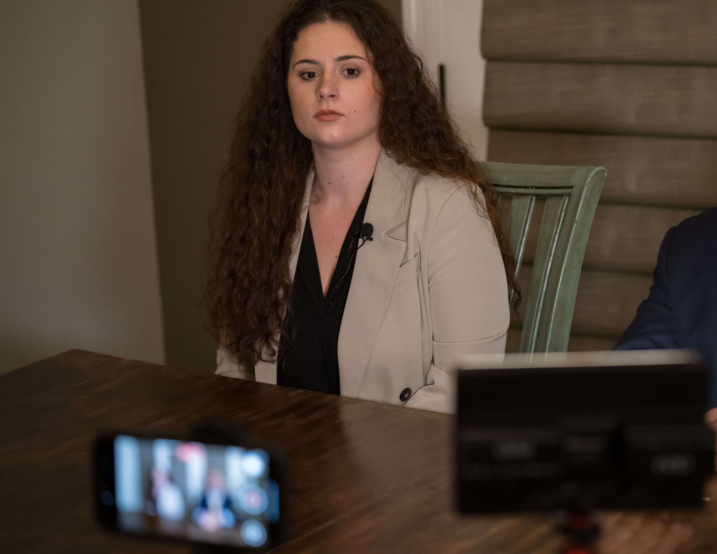 Baton Rouge, La., attorney Morgyn Young, who plans to file in federal court, talks about her client, Joseph "Tucker" Daniels, at Daniels' home in Thibodaux, La., Thursday, Nov. 13, 2025. (AP Photo/Matthew Hinton)