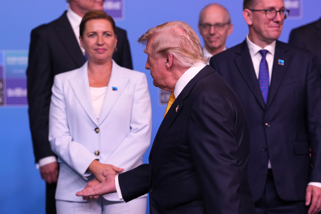 From left, Denmark's Prime Minister Mette Frederiksen, President Donald Trump and Estonia's Prime Minister Kristen Michal, during a group photo of NATO heads of state and government at the NATO summit in Ankara, Turkey, Wednesday, July 8, 2026. (AP Photo/Francisco Seco)