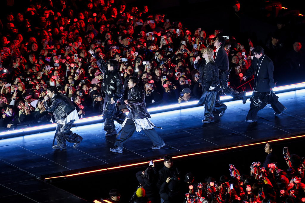 FILE - Kpop group BTS perform during 'BTS The Comeback Live Arirang' concert in central Seoul, South Korea, March 21, 2026. (Kim Hong-Ji/Pool Photo via AP, File)