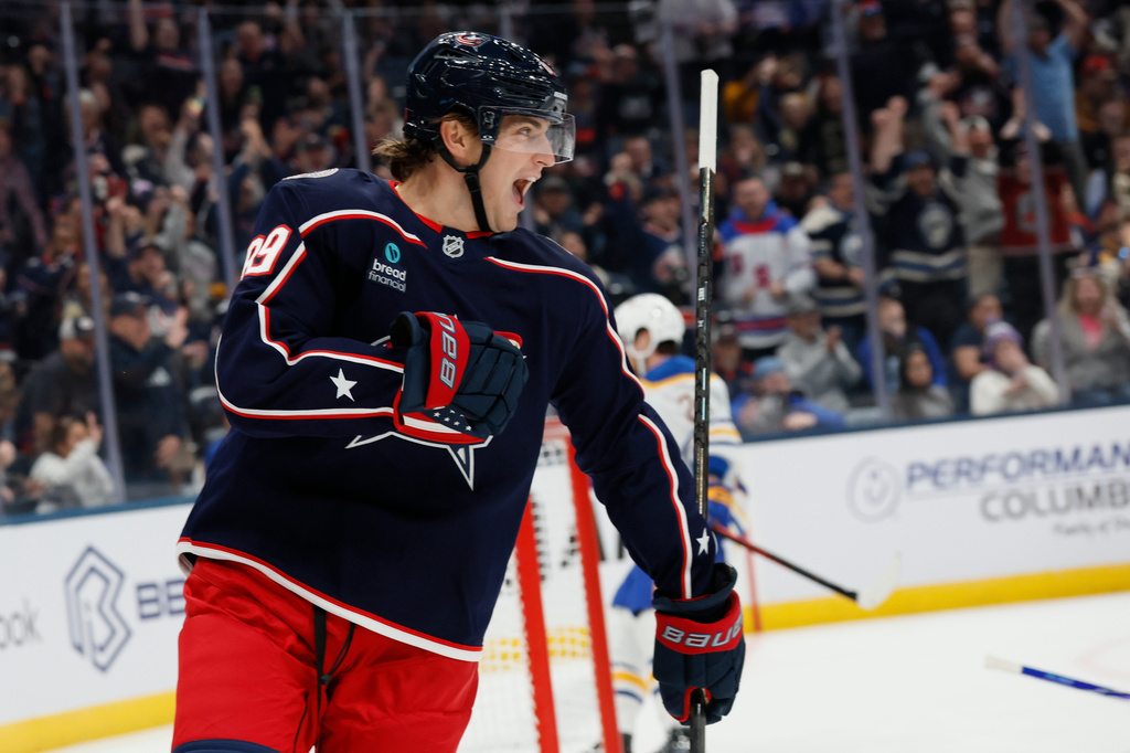 Columbus Blue Jackets' Matthew Knies celebrates after his goal against the Buffalo Sabres during the second period of an NHL hockey game, Thursday, Oct. 1, 2026, in Columbus, Ohio. (AP Photo/Jay LaPrete)