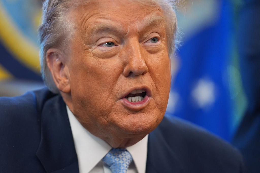 President Donald Trump speaks during a meeting with the White House task force on the 2026 FIFA World Cup in the Oval Office of the White House, Monday, Nov. 17, 2025, in Washington. (AP Photo/Evan Vucci)