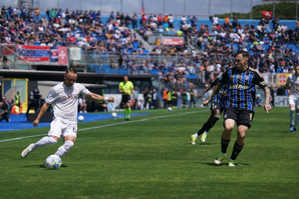 Napoli's Stanislav Lobotka drives the ball during the Serie A soccer match between Pisa and Napoli in Pisa, Italy, Sunday May 17 2026. (Alessandro La Rocca/LaPresse via AP)