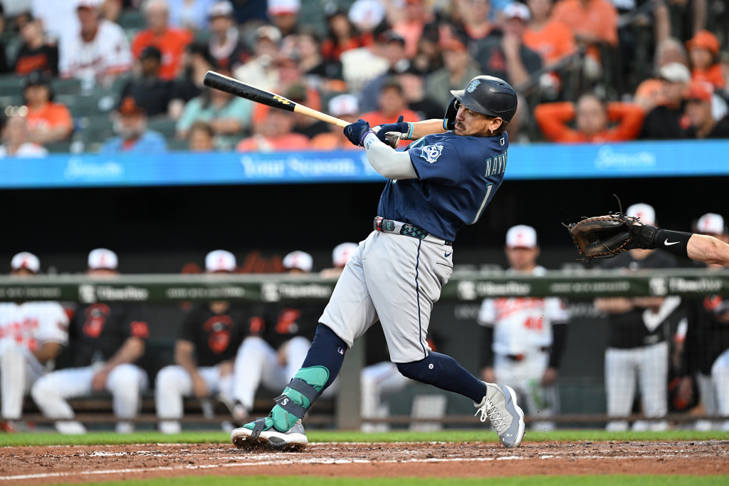 Seattle Mariners' Josh Naylor follows through on a grand slam against the Baltimore Orioles in the fifth inning of a baseball game, Monday, June 8, 2026, in Baltimore. (AP Photo/Gail Burton)
