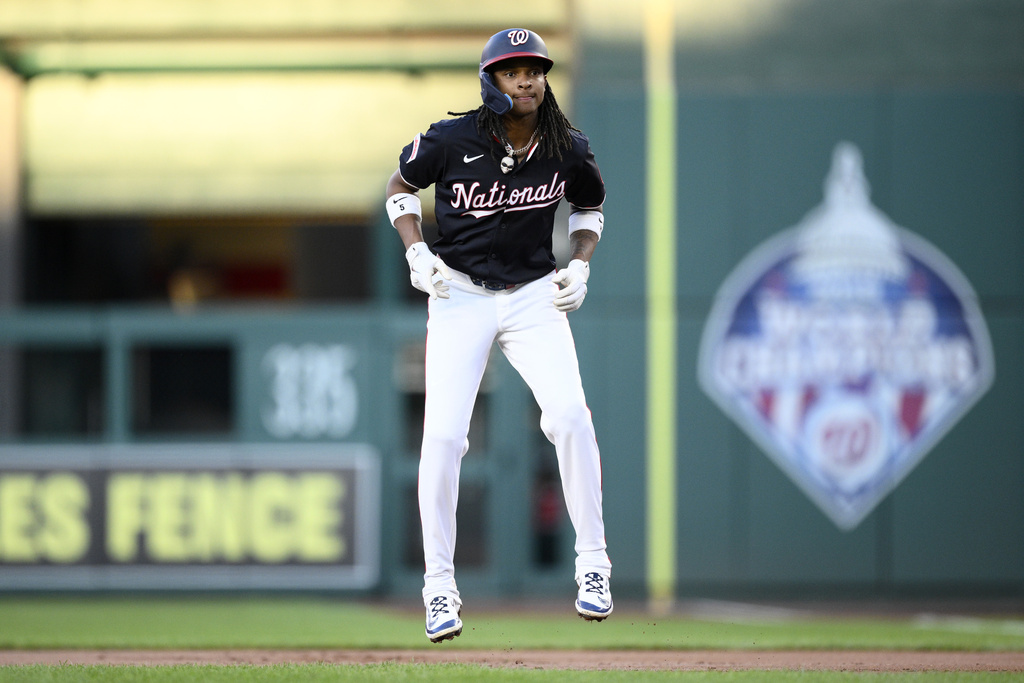 Washington Nationals' CJ Abrams takes a lead from first base during the first inning of a baseball game against the Miami Marlins, Tuesday, Sept. 2, 2025, in Washington. (AP Photo/Nick Wass)