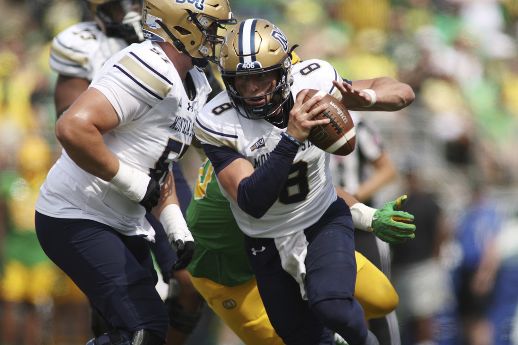 Montana State quarterback Justin Lamson (8) runs the ball during the first half of an NCAA college football game against Oregon, Saturday, Aug. 30, 2025, in Eugene, Ore. (AP Photo/Lydia Ely)