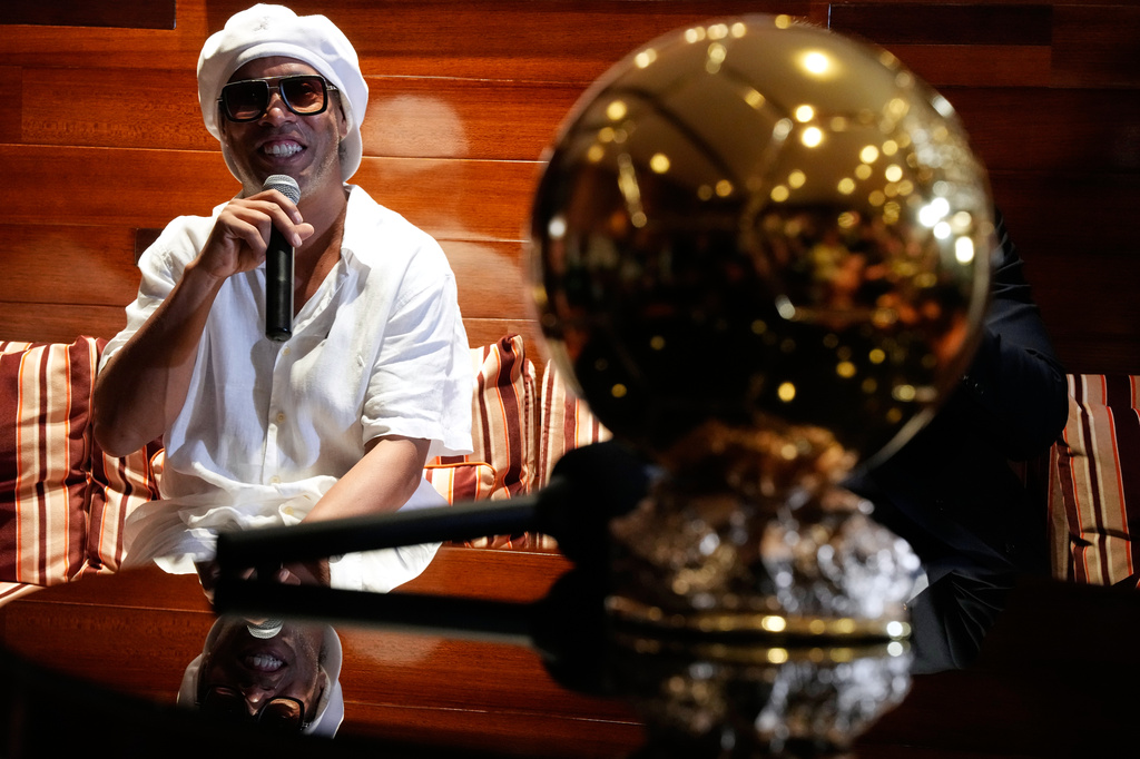 Brazilian football legend Ronaldinho speaks at a media event to promote his recent signing with Italian soccer club Ravenna FC, at Cipriani Downtown Miami, Tuesday, June 23, 2026, in Miami. (AP Photo/Rebecca Blackwell)