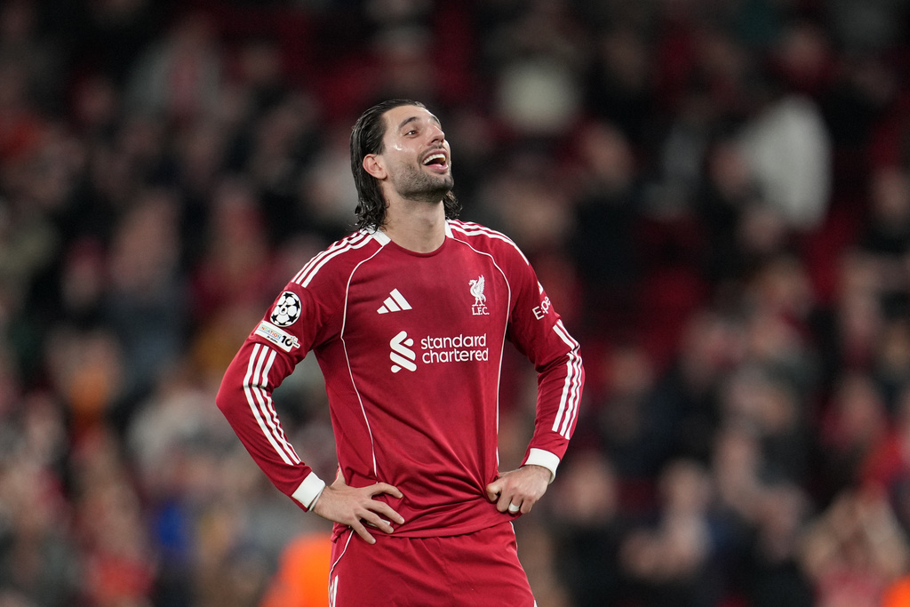 Liverpool's Dominik Szoboszlai reacts at the end of the second leg of the Champions League round of 16 soccer match between Liverpool and Galatasaray, in Liverpool, England, Wednesday, March 18, 2026. (AP Photo/Jon Super)