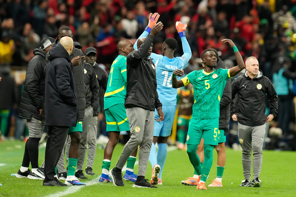 FILE - Senegal's Idrissa Gueye calls players to walk off the ptich during the Africa Cup of Nations final soccer match between Senegal and Morocco, in Rabat, Morocco, Sunday, Jan. 18, 2026. (AP Photo/Mosa'ab Elshamy, File)