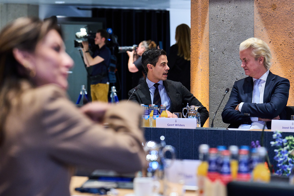Rob Jetten, leader of the Democrats '66 (D66), centre, and Far-right anti Islam lawmaker Geert Wilders talk before a meeting with speaker of the House Martin Bosma, in The Hague, Netherlands, Tuesday, Nov. 4, 2025. (AP Photo/Phil Nijhuis)