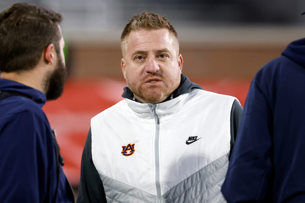 FILE - Auburn head coach Alex Golesh watches practice for the Senior Bowl NCAA college football game, Jan. 28, 2026, in Mobile, Ala. (AP Photo/Butch Dill, File)
