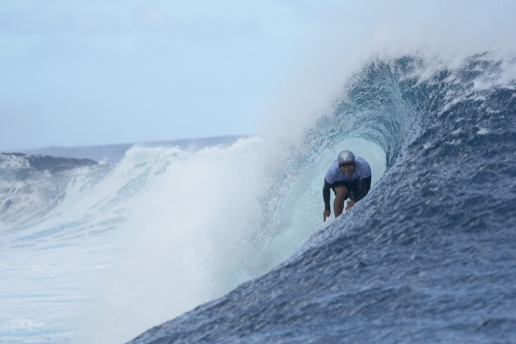 Surfers, staff and locals make final preparations in Tahiti before the ...