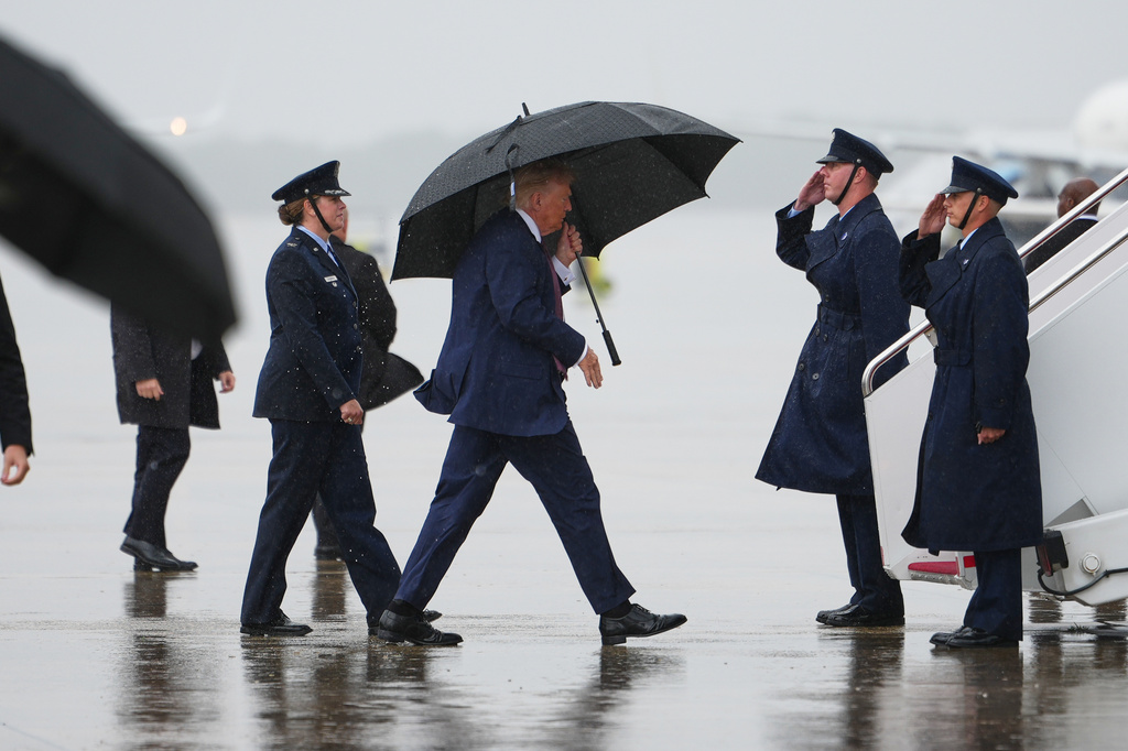 President Donald Trump prepares to board Air Force One, Tuesday, June 23, 2026, at Joint Base Andrews, Md. (AP Photo/Julia Demaree Nikhinson)