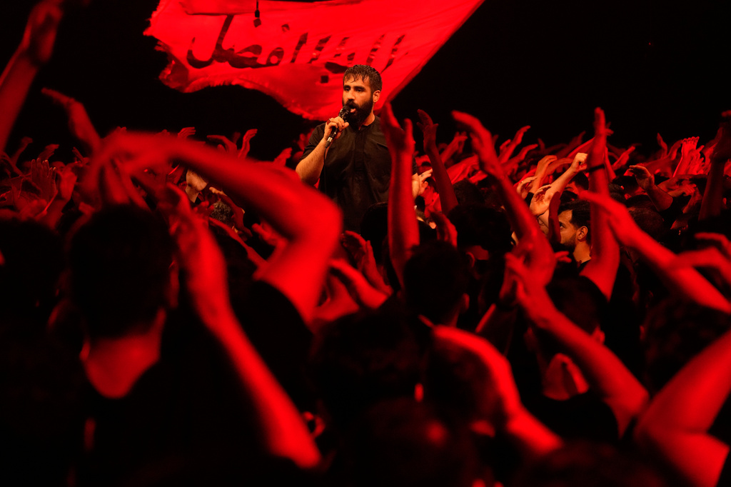 Iranians attend a mourning ceremony in Tehran, Iran, Tuesday, June 23, 2026, prior to Ashoura, which commemorates the 7th-century martyrdom of Imam Hussein, one of Prophet Muhammad's grandsons and one of Shiite Islam's most beloved saints, and 72 of his companions, who were killed in a battle in Karbala in present-day Iraq. (AP Photo/Vahid Salemi)