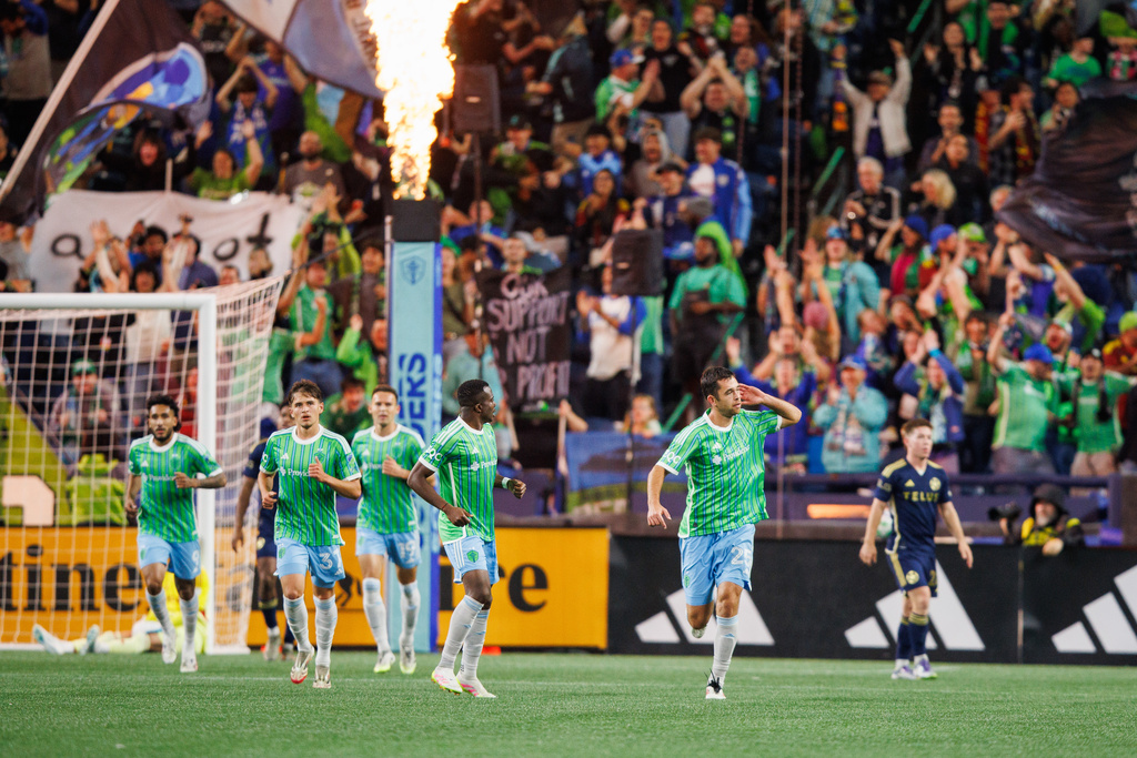 Seattle Sounders FC defender Jackson Ragen celebrates scoring a goal during the second half of an MLS soccer match against Vancouver Whitecaps FC on Saturday, Sept. 27, 2025, in Seattle. (AP Photo/Kevin Ng)
