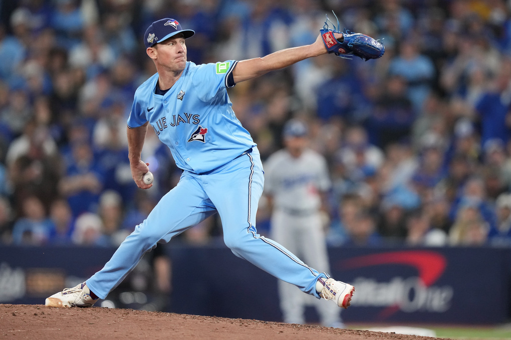 Toronto Blue Jays pitcher Chris Bassitt delivers against the Los Angeles Dodgers during the ninth inning in Game 6 of baseball's World Series in Toronto, Friday, Oct. 31, 2025. (Nathan Denette/The Canadian Press via AP)