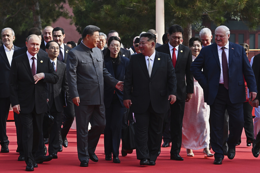 Front from left, Russian President Vladimir Putin, Chinese President Xi Jinping, North Korean leader Kim Jong Un and Belarusian President Alexander Lukashenko arrive at a military parade to commemorate the 80th anniversary of Japan's World War II surrender in Beijing, China, Wednesday, Sept. 3, 2025. (Sergei Bobylev, Sputnik, Kremlin Pool Photo via AP)