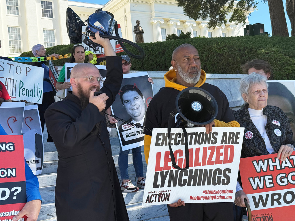 The Rev. Jeff Hood speaks at a protest against the death penalty on Wednesday, Oct. 22, 2025, at the Alabama Capitol in Montgomery, Ala. (AP Photo/Kim Chandler)