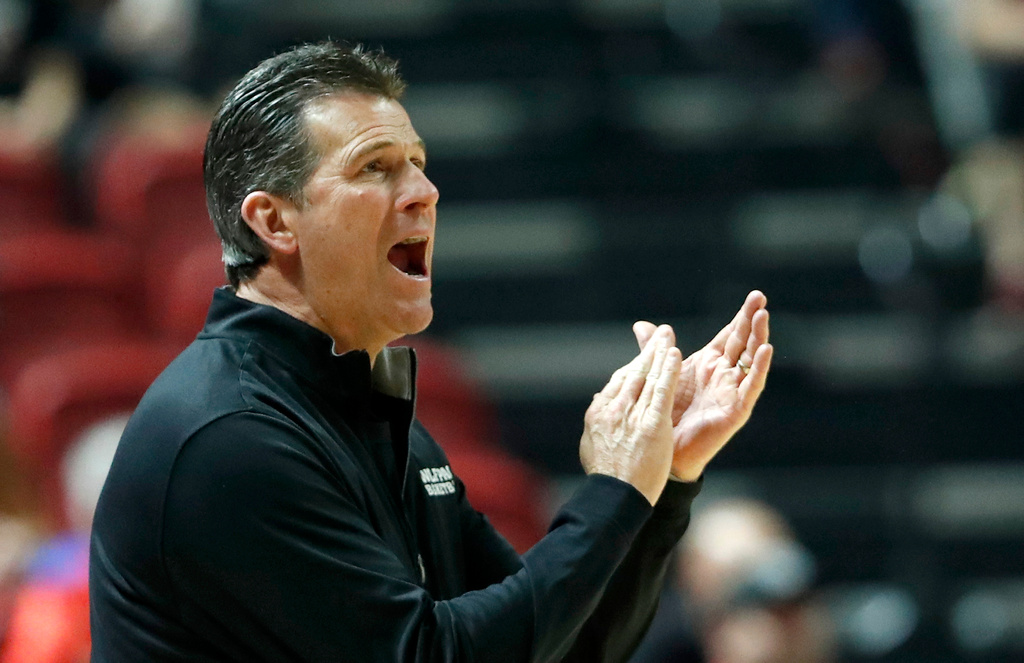 FILE - Nevada coach Steve Alford applauds a play during the first half of the team's NCAA basketball game against UNLV on Feb. 17, 2024, in Las Vegas. (Steve Marcus/Las Vegas Sun via AP, File)