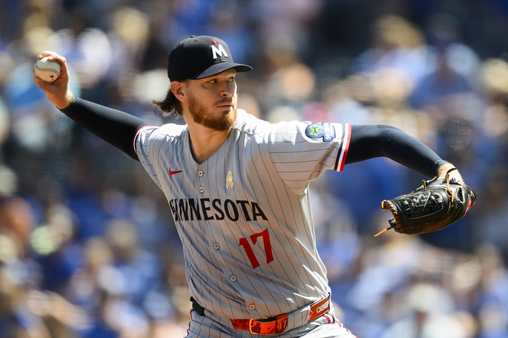 Minnesota Twins starting pitcher Bailey Ober throws to a Kansas City Royals batter during the first inning of a baseball game in Kansas City, Mo., Sunday, Sept. 7, 2025. (AP Photo/Reed Hoffmann)