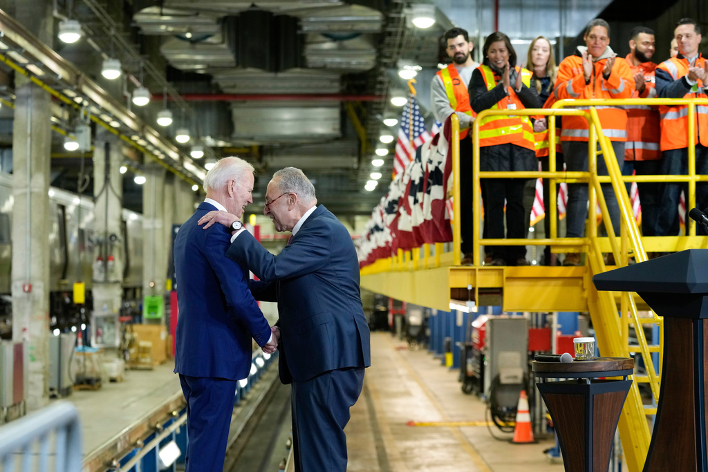 FILE - President Joe Biden is greeted by Senate Majority Leader Sen. Chuck Schumer of N.Y., as he arrives to speak at the construction site of the Hudson Tunnel Project in New York, Jan. 31, 2023, during an event on infrastructure. (AP Photo/Susan Walsh, File)