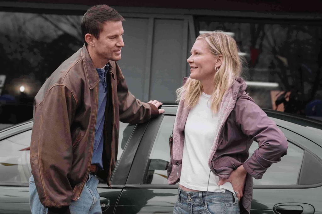 This image released by Paramount Pictures shows Channing Tatum, left, and Kirsten Dunst in a scene from "Roofman." (Davi Russo/Paramount Pictures via AP)