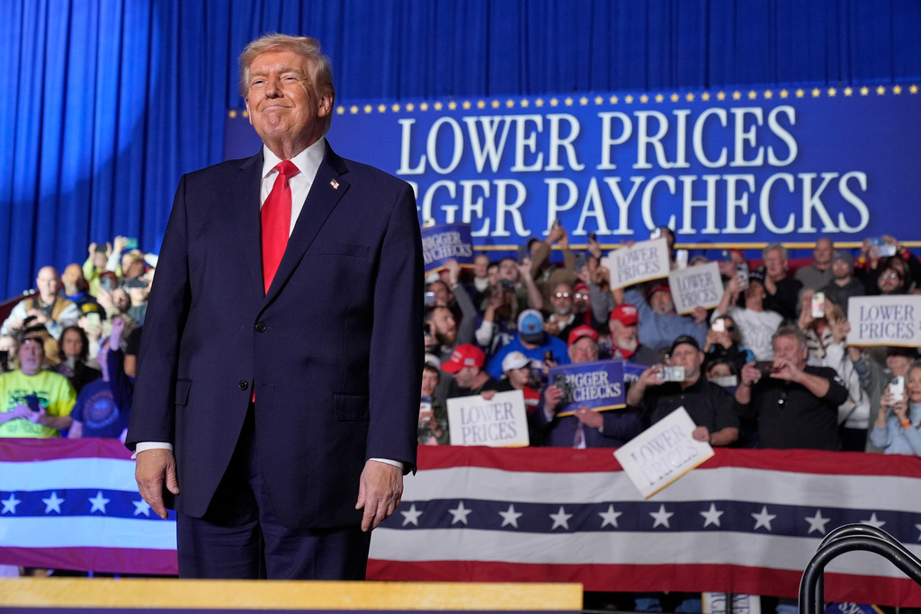 President Donald Trump arrives for an event at the Horizon Events Center in Clive, Iowa, Tuesday, Jan. 27, 2026. (AP Photo/Mark Schiefelbein)