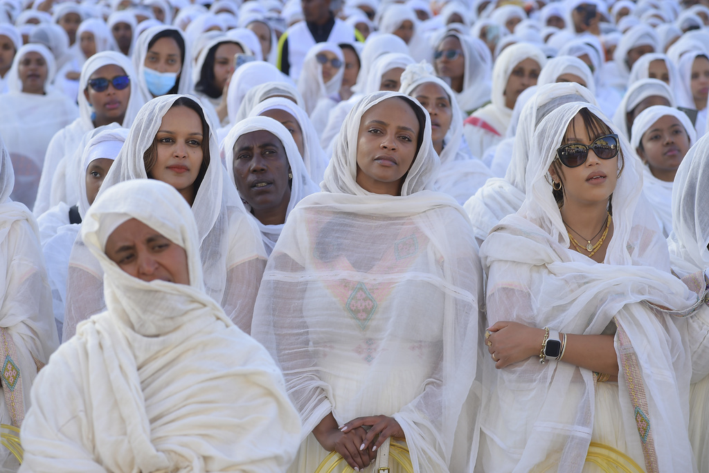 Ethiopian pilgrims pray during a Mass service for Ethiopian Christmas at the Bole Medhane Alem cathedral in Addis Ababa, Ethiopia, Monday, Jan. 6, 2025. (AP Photo)