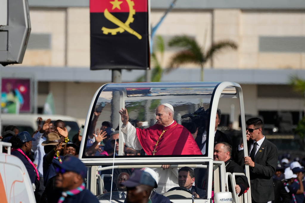 Pope Leo XIV waves after arriving in Luanda, Angola, Saturday, April 18, 2026 on the sixth day of his 11-day pastoral visit to Africa. (AP Photo/Themba Hadebe)