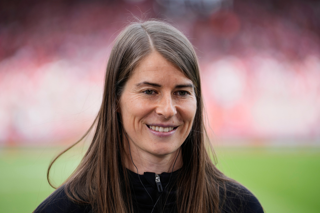 New head coach of German Bundesliga soccer club 1. FC Union Berlin Marie-Louise Eta looks on during the warm up prior to the German Bundesliga soccer match between FC Union Berlin and Wolfsburg in Berlin, Germany, Saturday, April 18, 2026. (AP Photo/Ebrahim Noroozi)