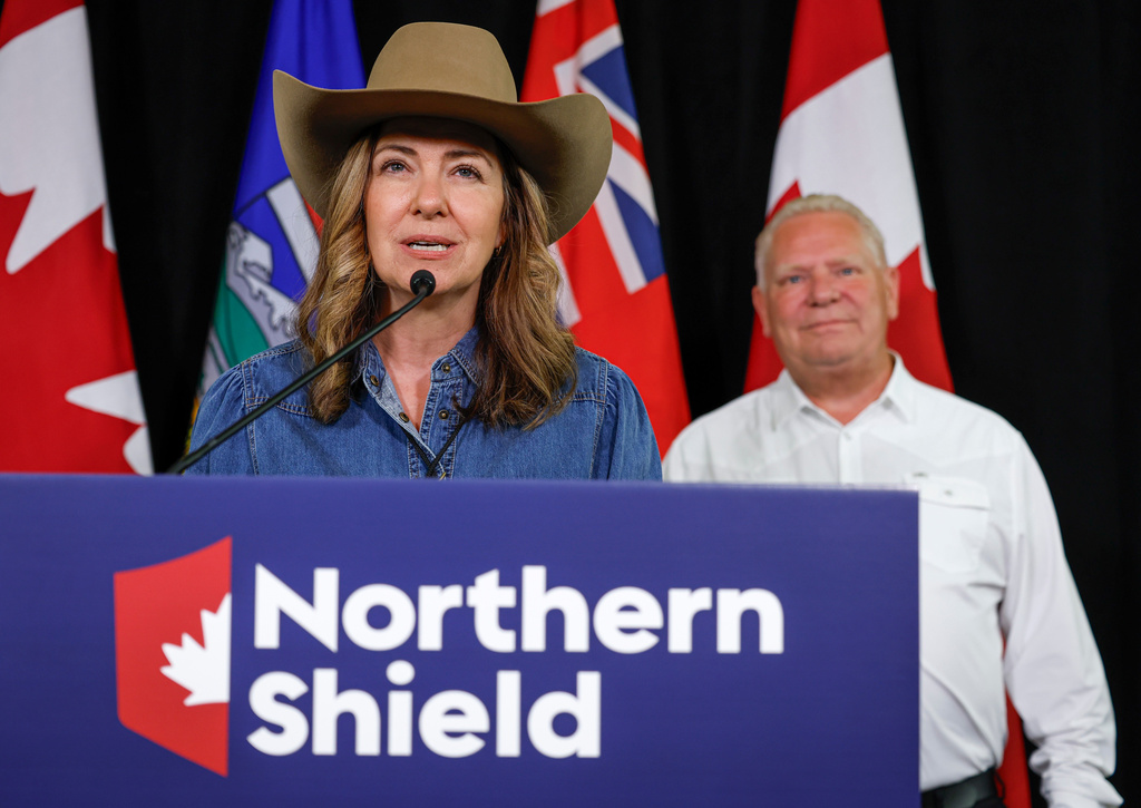 Alberta Premier Danielle Smith, left, and Ontario Premier Doug Ford announce the Northern Shield pipeline proposal in Calgary, Canada, Monday, July 6, 2026. (Jeff McIntosh/The Canadian Press via AP)