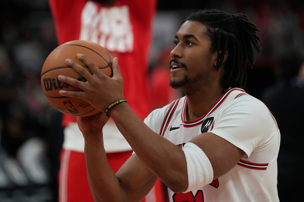 FILE - Chicago Bulls guard Jaden Ivey warms up before an NBA basketball game against the Toronto Raptors, Thursday, Feb. 19, 2026, in Chicago. (AP Photo/Erin Hooley, File)