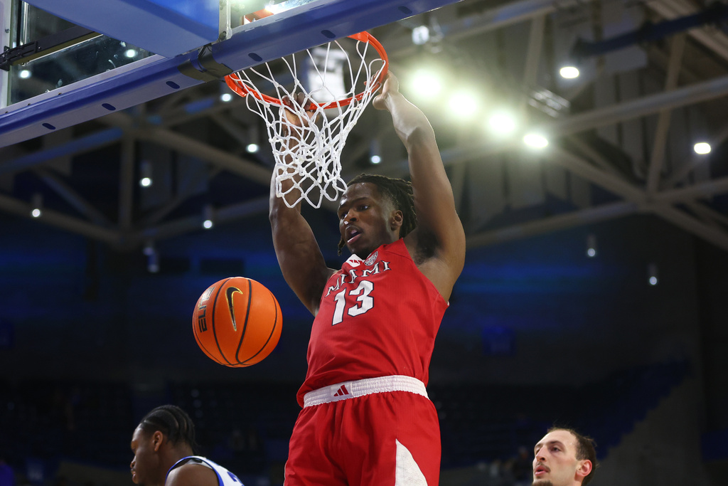 Miami (OH) forward Antwone Woolfolk dunks the ball during the first half of an NCAA college basketball game against Buffalo, Tuesday, Feb. 3, 2026, in Buffalo, N.Y. (AP Photo/Jeffrey T. Barnes)