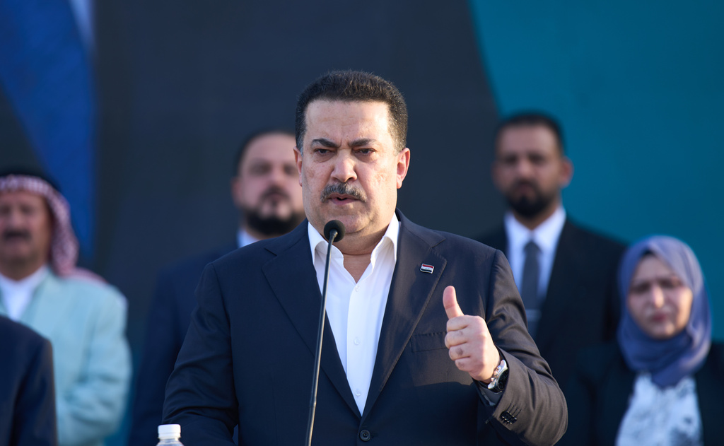 FILE - Iraqi Prime Minister Mohammed Shia al-Sudani speaks at his political block campaign rally before the parliamentary elections in Mosul, Iraq, Saturday, Oct. 18, 2025. (AP Photo/Hadi Mizban, file)