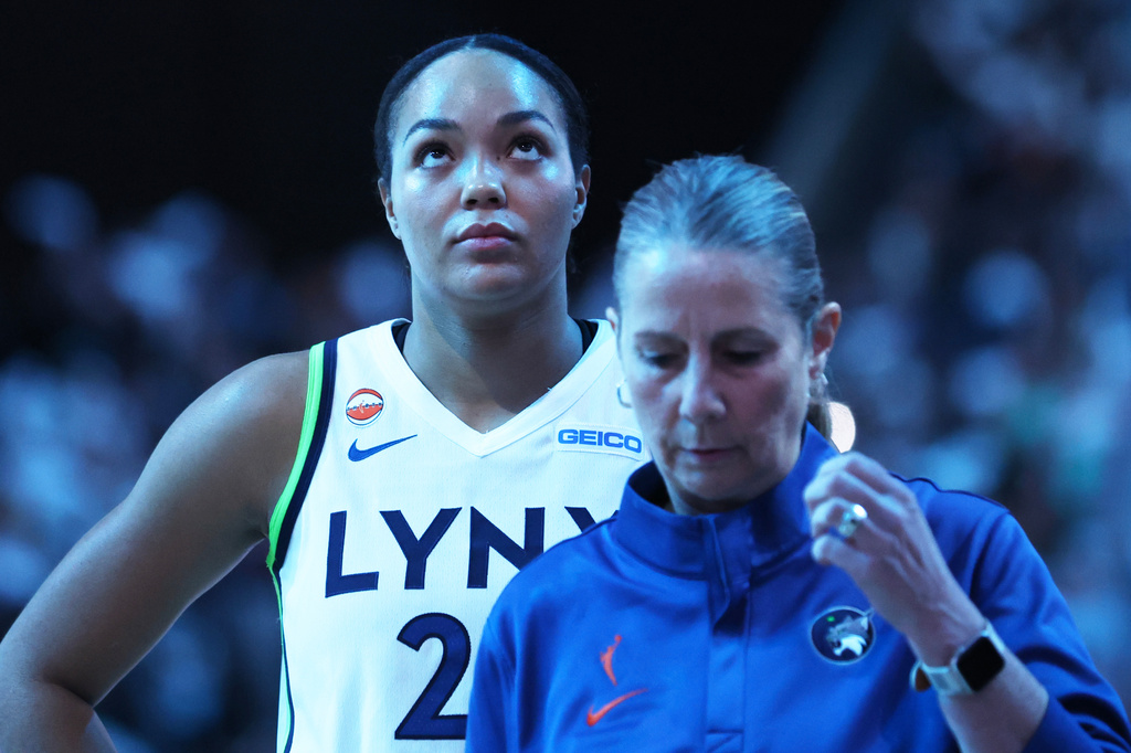 Minnesota Lynx forward Napheesa Collier stands behind Minnesota Lynx head coach Cheryl Reeve before Game 2 of a WNBA basketball first-round playoff series against the New York Liberty, Tuesday, Sept. 29, 2026, in New York. (AP Photo/Heather Khalifa)