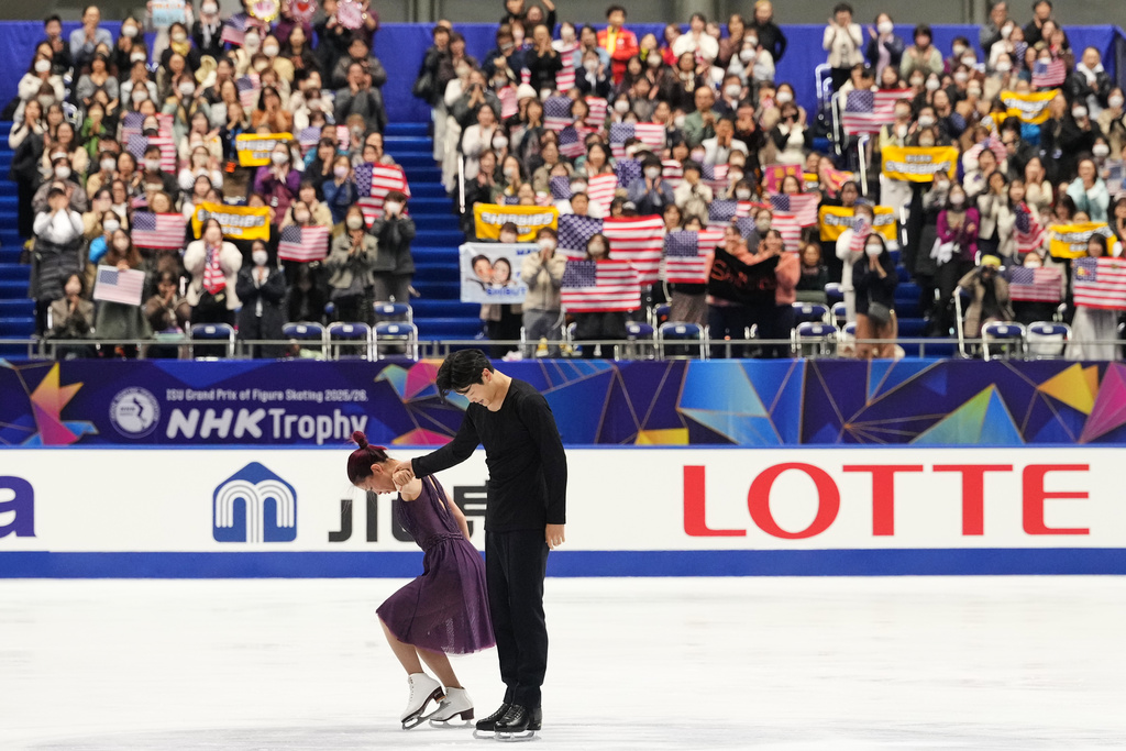 Maia Shibutani and Alex Shibutani, of the U.S., acknowledges the crowd after performing during the ice dance free dance program in the ISU Grand Prix of Figure Skating - NHK Trophy in Kadoma, east of Osaka, western Japan, Saturday, Nov. 8, 2025. (AP Photo/Hiro Komae)