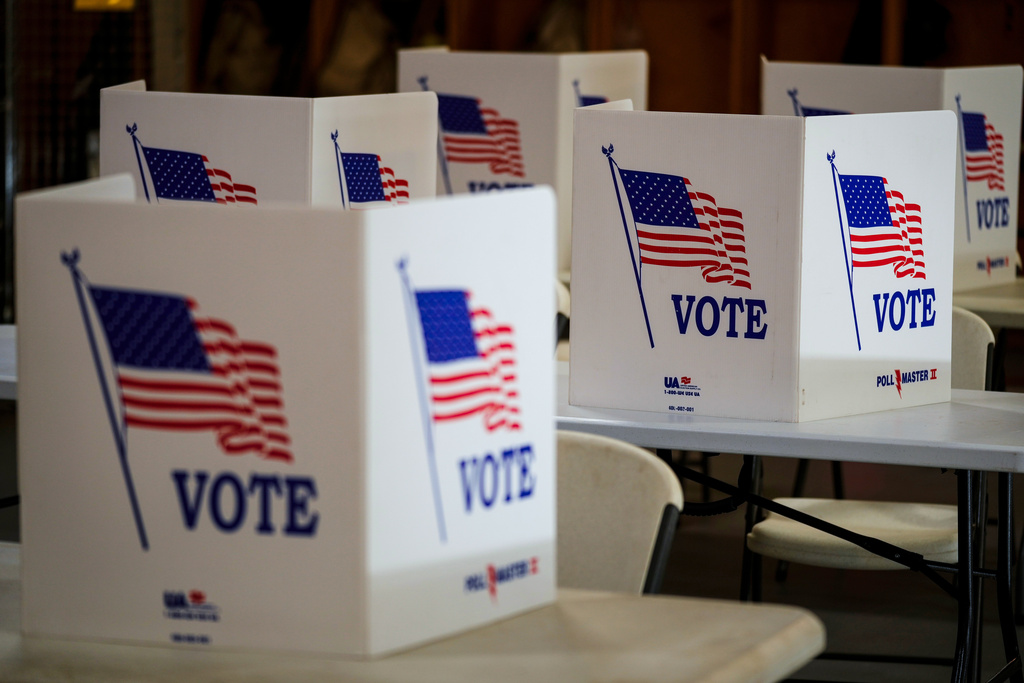 FILE- Voting booths are set up at a polling place in Newtown, Pa, April 23, 2024. (AP Photo/Matt Rourke, File)