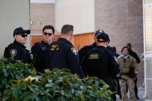 Law enforcement officers are seen outside a United States Immigration and Customs Enforcement (ICE) facility in Portland, Ore., Monday, Oct. 20, 2025. (AP Photo/Jenny Kane) Law enforcement officers are seen outside a United States Immigration and Customs Enforcement (ICE) facility in Portland, Ore., Monday, Oct. 20, 2025. (AP Photo/Jenny Kane)