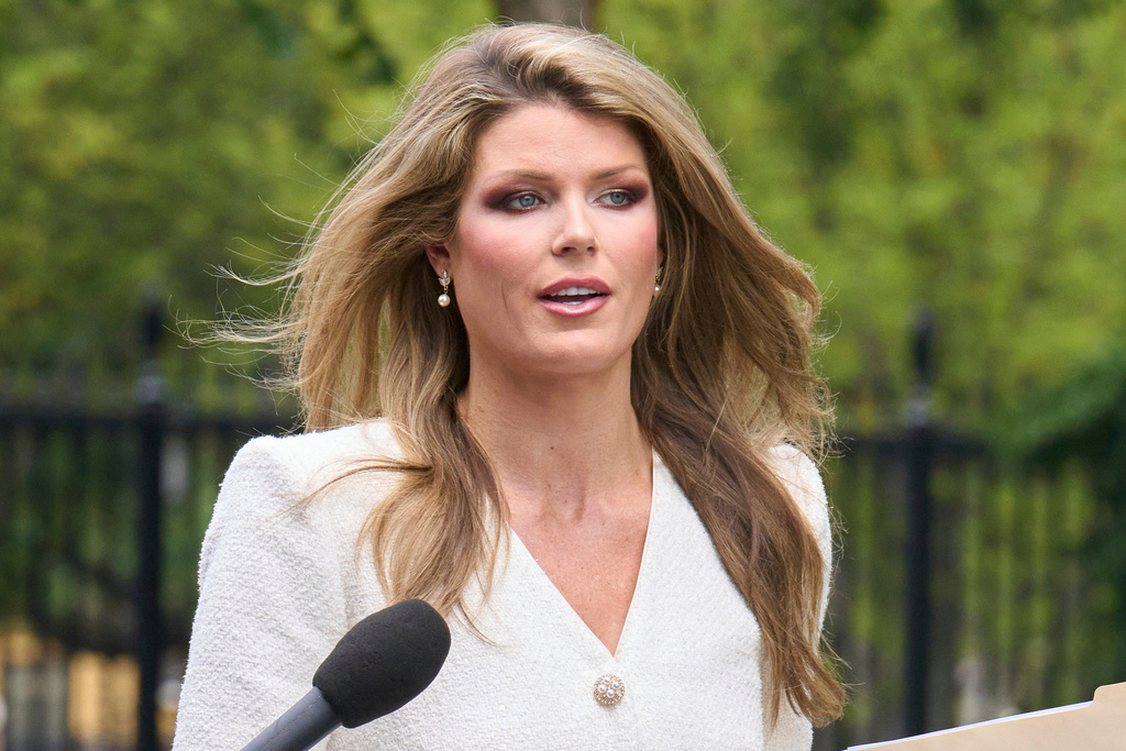 FILE - Lindsey Halligan, outside of the White House, Aug. 20, 2025, in Washington. (AP Photo/Jacquelyn Martin, File)