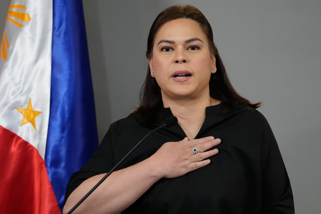 Philippine Vice President Sara Duterte gestures as she announces her intention to run for president in the next elections during a press conference on Wednesday, Feb. 18, 2026, in Manila, Philippines. (AP Photo/Aaron Favila)