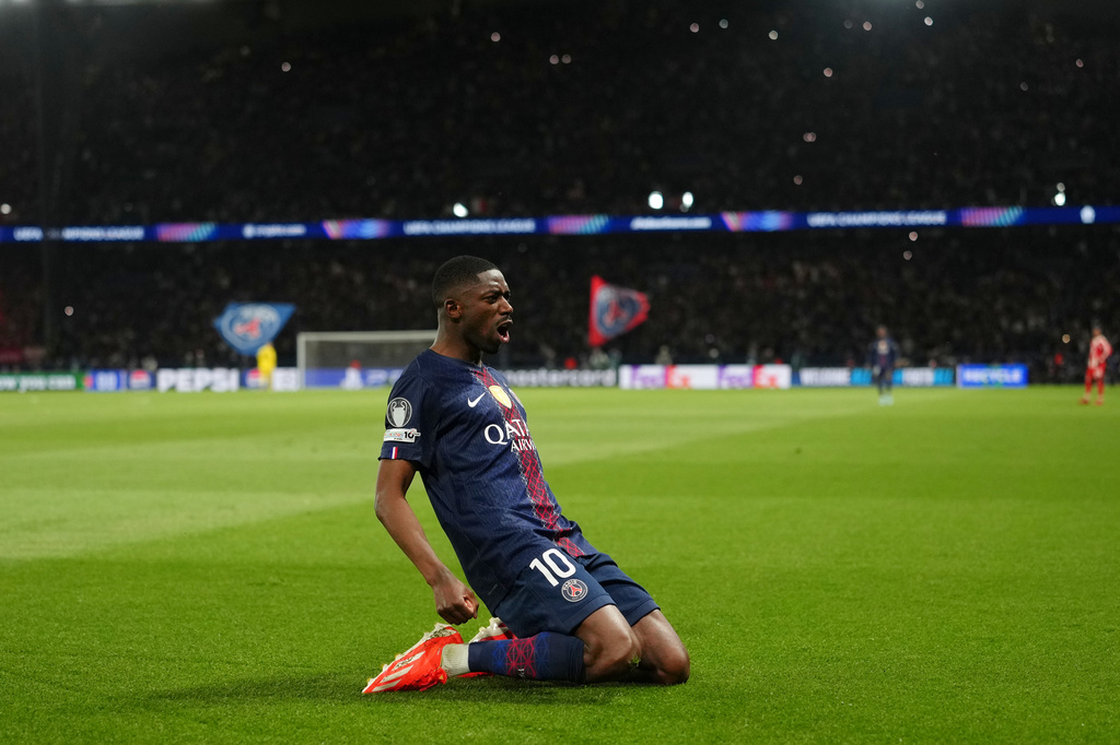 PSG's Ousmane Dembele celebrates after scoring his side's third goal during a Champions League semifinal, first leg, soccer match between Paris Saint-Germain and Bayern Munich in Paris, Tuesday, April 28, 2026. (AP Photo/Aurelien Morissard)