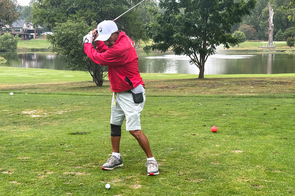 Bob Walls, a 103-year-old golfer, tees off on the third hole at Steve Hogan Golf Course in Omaha, Neb., Friday, July 24, 2026. (AP Photo/Eric Olson)