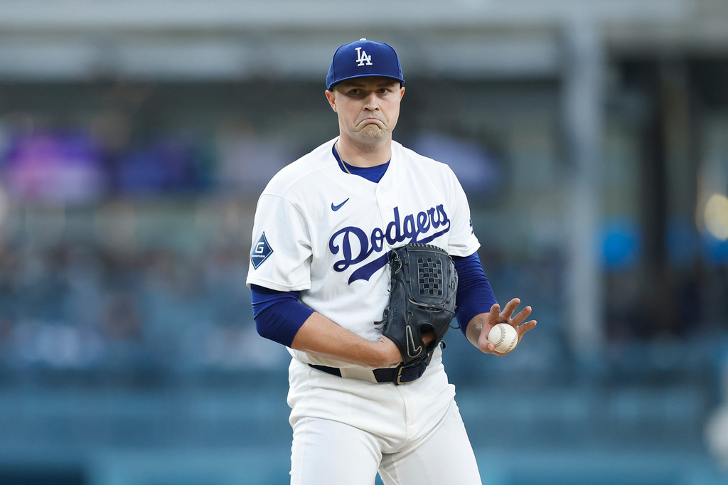 Los Angeles Dodgers starting pitcher Tarik Skubal reacts between batters during the first inning of a baseball game against the Kansas City Royals, Monday, Aug. 10, 2026, in Los Angeles. (AP Photo/Caroline Brehman)