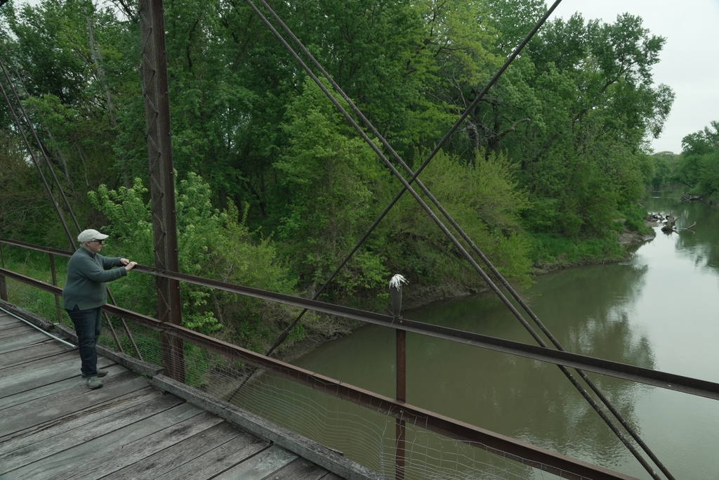 Mary Swander looks out over Lake Darling, Friday, May 8, 2026, in Brighton, Iowa. (AP Photo/Brittany Peterson)
