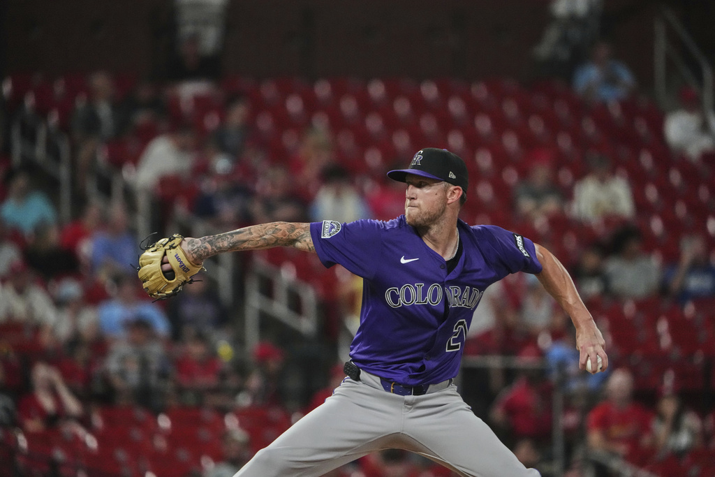 Colorado Rockies starting pitcher Kyle Freeland throws during the seventh inning of a baseball game against the St. Louis Cardinals Tuesday, Aug. 12, 2025, in St. Louis. (AP Photo/Jeff Roberson)