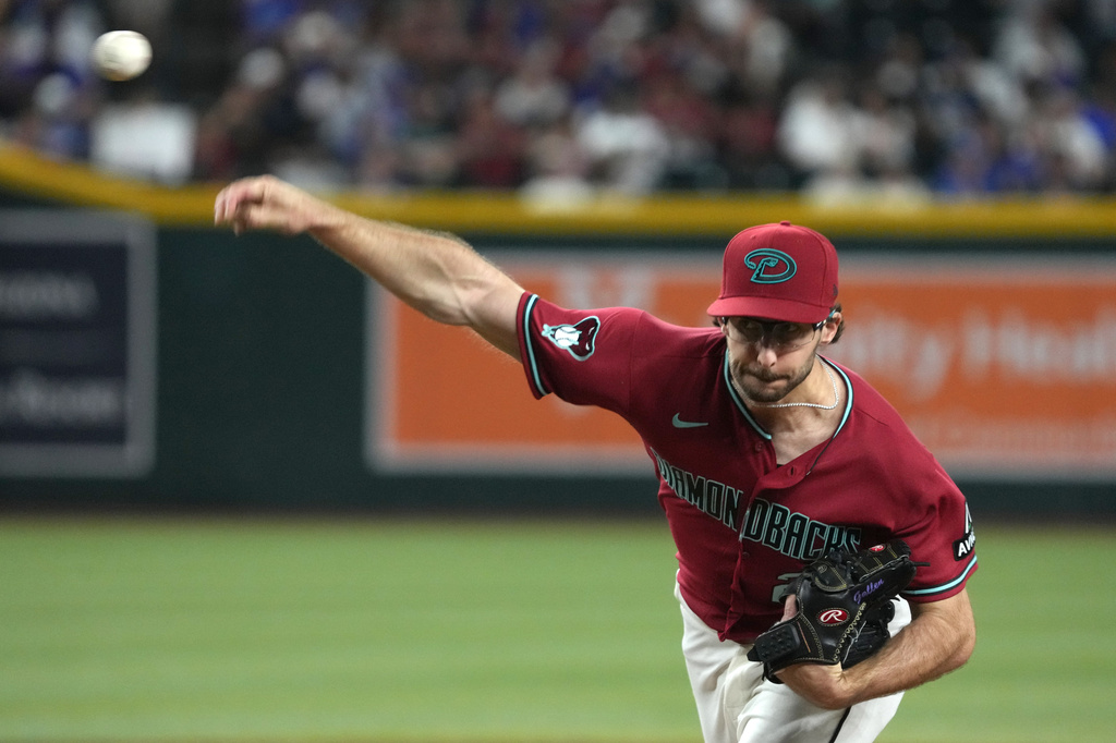 Arizona Diamondbacks pitcher Zac Gallen throws against the Los Angeles Dodgers in the first inning of a baseball game, Wednesday, June 3, 2026, in Phoenix. (AP Photo/Rick Scuteri)
