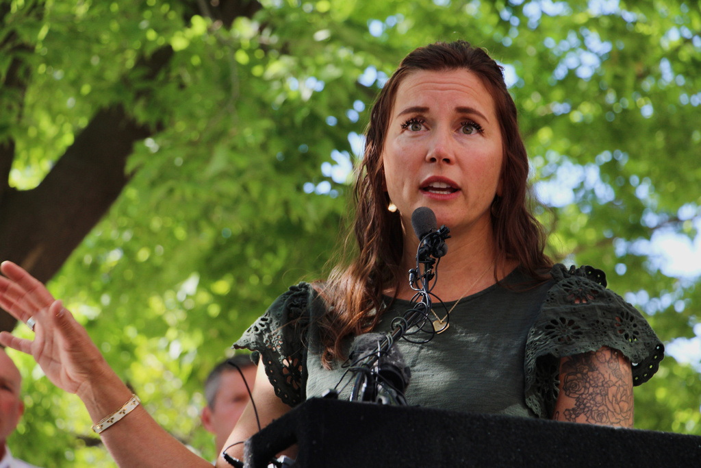 Salt Lake City Mayor Erin Mendenhall speaks to reporters Tuesday, Aug. 12, 2025, across the street from a city block where several downtown bars and restaurants were destroyed in a fire. (AP Photo/Hannah Schoenbaum)