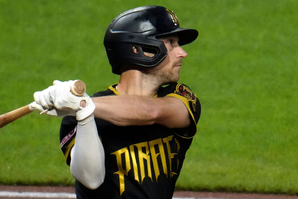 Pittsburgh Pirates' Brandon Lowe watches his three-home run off Boston Red Sox pitcher Jovani Morán during the fifth inning of a baseball game in Pittsburgh, Friday, Aug. 14, 2026. (AP Photo/Gene J. Puskar)