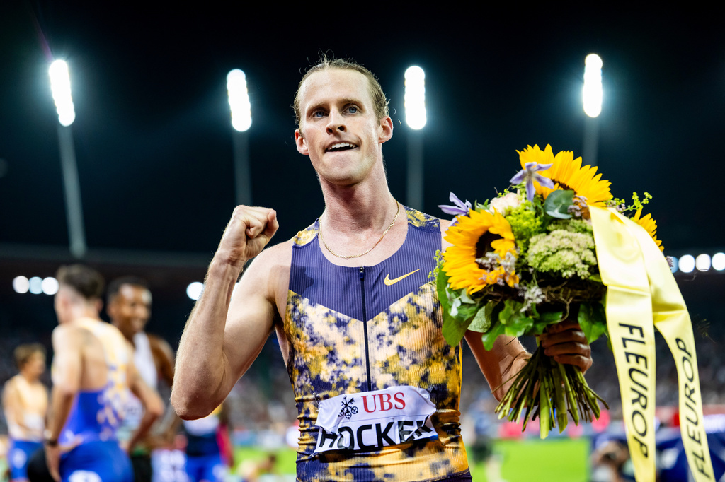 Cole Hocker of United States celebrates during winning the men's 1500 meters at the World Athletics Diamond League Weltklasse Zurich athletics meeting at the Letzigrund stadium in Zurich, Switzerland, on Thursday, Aug. 27, 2026. (Jean-Christophe Bott/Keystone via AP)