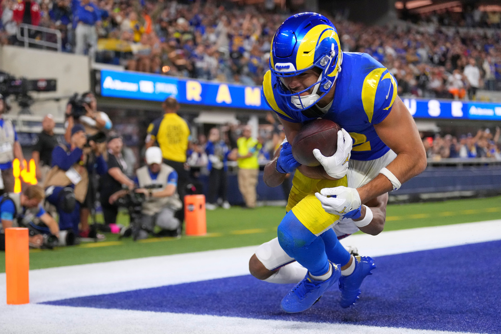 Los Angeles Rams wide receiver Puka Nacua falls after making a touchdown catch during the second half of an NFL football game against the Buffalo Bills, Monday, Oct. 12, 2026, in Inglewood, Calif. (AP Photo/Scott Strazzante)