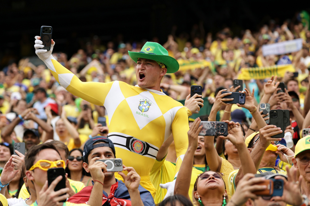 Fans of Brazil cheer from the stands ahead of the World Cup round of 16 soccer match between Brazil and Norway in East Rutherford, N.J., near New York, Sunday, July 5, 2026. (AP Photo/Adam Hunger)